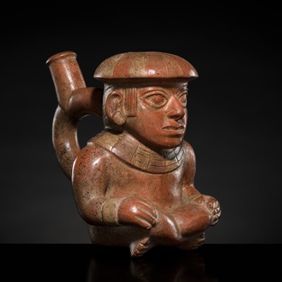Lot 141 - A CERAMIC STIRRUP-SPOUT VESSEL IN THE FORM OF A SEATED FIGURE, MOCHE CULTURE