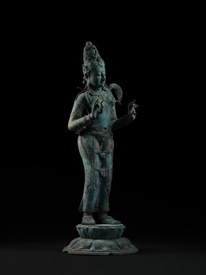 Lot 223 - A RARE AND EXCEPTIONALLY LARGE BRONZE FIGURE OF DEWI SRI, BORNEO, 12TH CENTURY