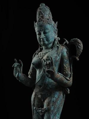 Lot 223 - A RARE AND EXCEPTIONALLY LARGE BRONZE FIGURE OF DEWI SRI, BORNEO, 12TH CENTURY