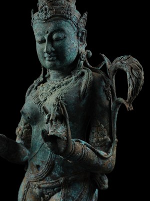 Lot 223 - A RARE AND EXCEPTIONALLY LARGE BRONZE FIGURE OF DEWI SRI, BORNEO, 12TH CENTURY