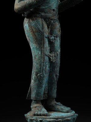 Lot 223 - A RARE AND EXCEPTIONALLY LARGE BRONZE FIGURE OF DEWI SRI, BORNEO, 12TH CENTURY