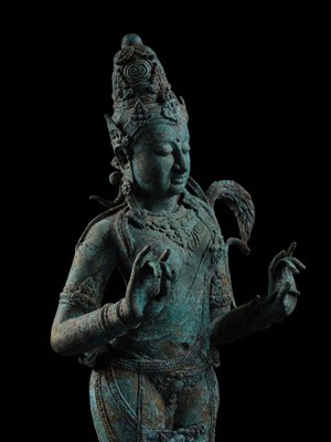 Lot 223 - A RARE AND EXCEPTIONALLY LARGE BRONZE FIGURE OF DEWI SRI, BORNEO, 12TH CENTURY