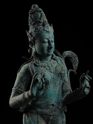 Lot 223 - A RARE AND EXCEPTIONALLY LARGE BRONZE FIGURE OF DEWI SRI, BORNEO, 12TH CENTURY