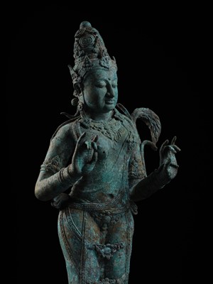 Lot 223 - A RARE AND EXCEPTIONALLY LARGE BRONZE FIGURE OF DEWI SRI, BORNEO, 12TH CENTURY