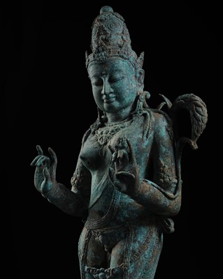 Lot 223 - A RARE AND EXCEPTIONALLY LARGE BRONZE FIGURE OF DEWI SRI, BORNEO, 12TH CENTURY