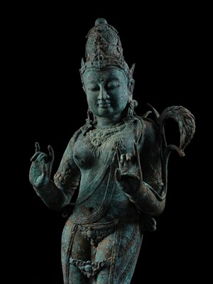 Lot 223 - A RARE AND EXCEPTIONALLY LARGE BRONZE FIGURE OF DEWI SRI, BORNEO, 12TH CENTURY