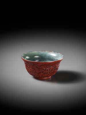 Lot 88 - AN EXCEEDINGLY RARE CINNABAR LACQUER-EMBELLISHED JADE BOWL, QIANLONG PERIOD