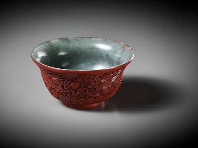 Lot 88 - AN EXCEEDINGLY RARE CINNABAR LACQUER-EMBELLISHED JADE BOWL, QIANLONG PERIOD