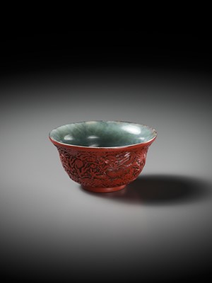 Lot 88 - AN EXCEEDINGLY RARE CINNABAR LACQUER-EMBELLISHED JADE BOWL, QIANLONG PERIOD