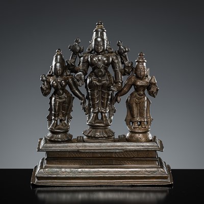 Lot 636 - A BRONZE TRIAD WITH VISHNU, SHRIDEVI, AND BHUDEVI, SOUTH INDIA, 17TH-18TH CENTURY