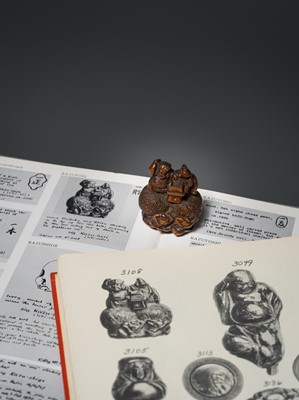 Lot 15 - KAZUNORI: A LARGE WOOD NETSUKE OF DAIKOKU AND EBISU AT SETSUBUN