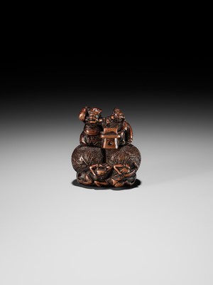 Lot 15 - KAZUNORI: A LARGE WOOD NETSUKE OF DAIKOKU AND EBISU AT SETSUBUN