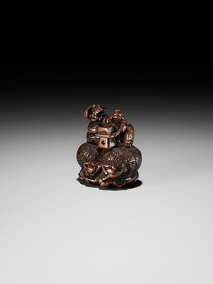 Lot 15 - KAZUNORI: A LARGE WOOD NETSUKE OF DAIKOKU AND EBISU AT SETSUBUN