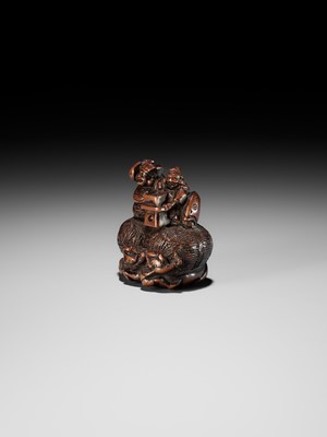 Lot 15 - KAZUNORI: A LARGE WOOD NETSUKE OF DAIKOKU AND EBISU AT SETSUBUN