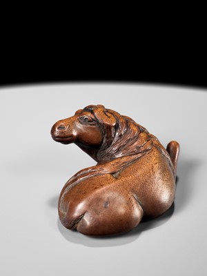 Lot 107 - YASUTADA: A RARE WOOD NETSUKE OF A RECUMBENT HORSE