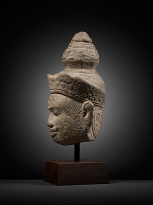 Lot 345 - A SANDSTONE HEAD OF VISHNU, ANGKOR PERIOD, 10TH-12TH CENTURY