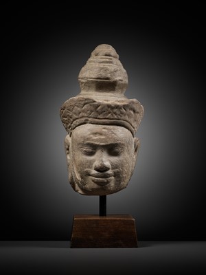 Lot 345 - A SANDSTONE HEAD OF VISHNU, ANGKOR PERIOD, 10TH-12TH CENTURY