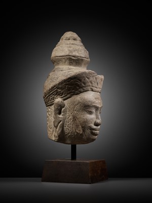 Lot 345 - A SANDSTONE HEAD OF VISHNU, ANGKOR PERIOD, 10TH-12TH CENTURY