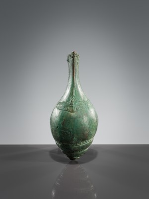 Lot 357 - A BRONZE RITUAL CONCH SHELL WITH A DANCING FIGURE OF HEVAJRA, ANGKOR PERIOD, BAYON STYLE
