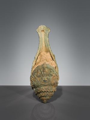 Lot 356 - A BRONZE RITUAL CONCH SHELL WITH A FIGURE OF HEVAJRA WITH YOGINIS, ANGKOR PERIOD, BAYON STYLE