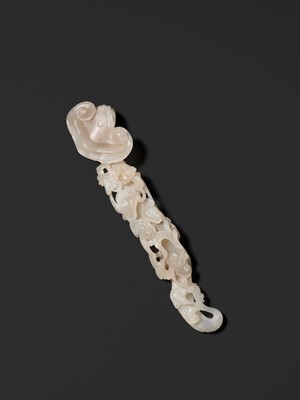 Lot 170 - A RETICULATED WHITE JADE RUYI IN THE FORM OF A LINGZHI WITH BATS, QING DYNASTY
