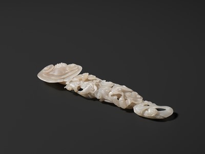 Lot 170 - A RETICULATED WHITE JADE RUYI IN THE FORM OF A LINGZHI WITH BATS, QING DYNASTY