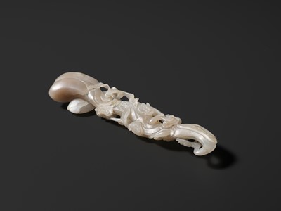 Lot 170 - A RETICULATED WHITE JADE RUYI IN THE FORM OF A LINGZHI WITH BATS, QING DYNASTY