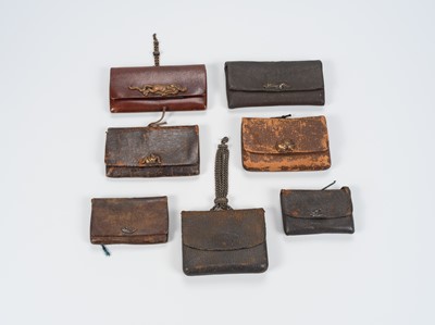 A GROUP OF SEVEN LEATHER TOBACCO POUCHES, TABAKO-IRE