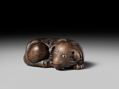 Lot 141 - A RARE WOOD NETSUKE OF A JAKONEKO (MUSK CAT)