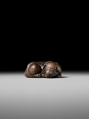 Lot 141 - A RARE WOOD NETSUKE OF A JAKONEKO (MUSK CAT)