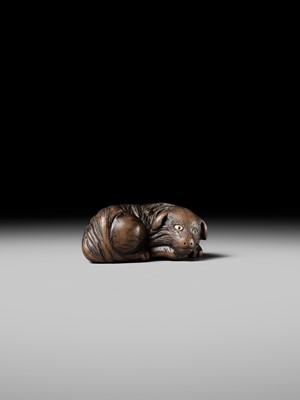 Lot 141 - A RARE WOOD NETSUKE OF A JAKONEKO (MUSK CAT)