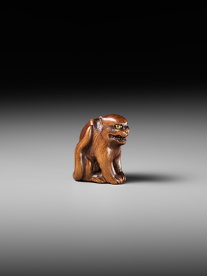 Lot 419 - A FINE WOOD NETSUKE OF A TIGER