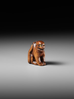 Lot 419 - A FINE WOOD NETSUKE OF A TIGER