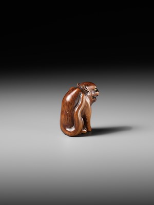 Lot 419 - A FINE WOOD NETSUKE OF A TIGER