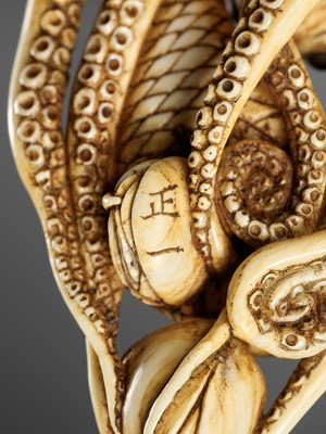 Lot 62 - MASAKAZU: A LARGE AND IMPRESSIVE OSAKA SCHOOL IVORY NETSUKE OF AN OCTOPUS WITH CLAMS