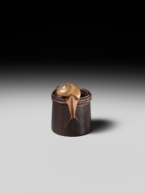 Lot 174 - SHIGEMASA: A SUPERB WOOD NETSUKE OF A SNAIL ON BUCKET