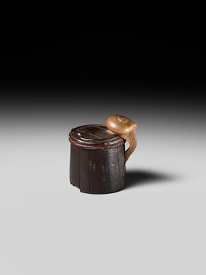 Lot 174 - SHIGEMASA: A SUPERB WOOD NETSUKE OF A SNAIL ON BUCKET