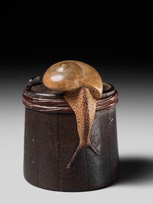 Lot 174 - SHIGEMASA: A SUPERB WOOD NETSUKE OF A SNAIL ON BUCKET