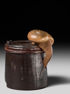 Lot 174 - SHIGEMASA: A SUPERB WOOD NETSUKE OF A SNAIL ON BUCKET