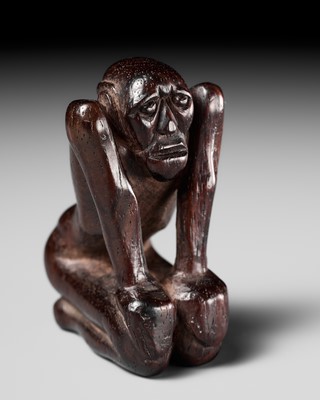 Lot 204 - KOICHI: AN UNUSUAL WOOD NETSUKE OF A KNEELING OLD MAN