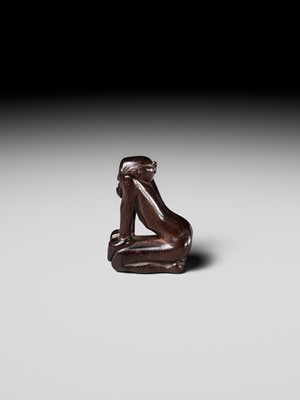 Lot 204 - KOICHI: AN UNUSUAL WOOD NETSUKE OF A KNEELING OLD MAN