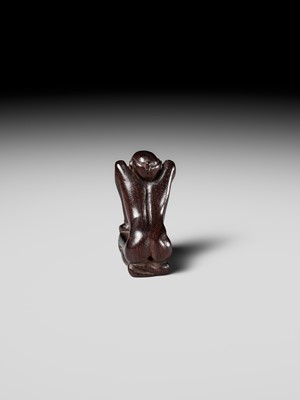 Lot 204 - KOICHI: AN UNUSUAL WOOD NETSUKE OF A KNEELING OLD MAN