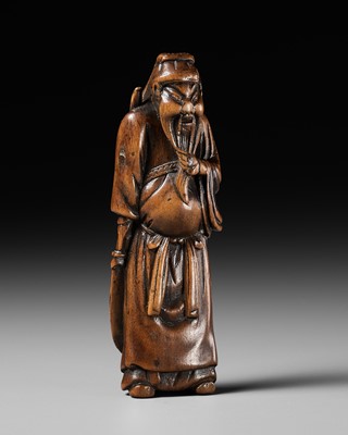 Lot 397 - A FINE WOOD NETSUKE OF KAN’U WITH HIS HALBERD