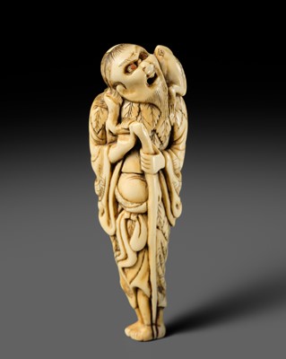 Lot 430 - A TALL IVORY NETSUKE OF GAMA SENNIN WITH HIS TOAD