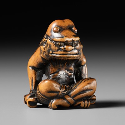 Lot 403 - A WOOD NETSUKE OF RAIJIN