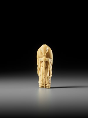 Lot 61 - A FINE IVORY NETSUKE OF A FOX PRIEST (HAKUZOSU)