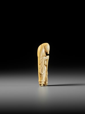 Lot 61 - A FINE IVORY NETSUKE OF A FOX PRIEST (HAKUZOSU)