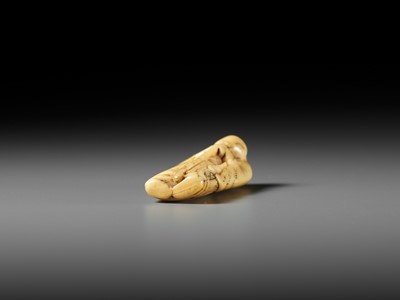 Lot 61 - A FINE IVORY NETSUKE OF A FOX PRIEST (HAKUZOSU)