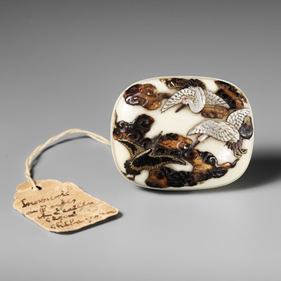 Lot 184 - SHIBAYAMA: A FINE LACQUERED AND INLAID IVORY MANJU NETSUKE DEPICTING CRANES AND CLOUDS