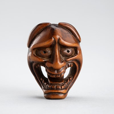 Lot 482 - A WOOD MASK NETSUKE OF AN ONI, EDO PERIOD